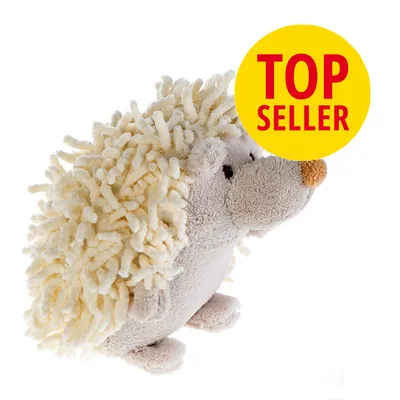 Plysbamse formet som pindsvin med beige garnpigge. Gul cirkel med rød tekst: TOP SELLER.