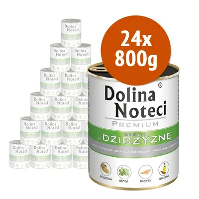 24 lattine da 800 g di Dolina Noteci Premium, visibile scritta 'BOGATA W DZICZYZNE', ingredienti illustrati: riso bruno, basilico, carota, olio di lino. 24 lattine da 800 g di Dolina Noteci Premium, visibile scritta 'BOGATA W DZICZYZNE', ingredienti illustrati: riso bruno, basilico, carota, olio di lino.