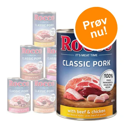 Rocco IT'S MEAT TIME CLASSIC PORK dåser, 400 g. Varianter: with beef & chicken, with beef & lamb, with chicken & turkey, with chicken & salmon. Tekst: Prøv nu! 100% fresh ingredients & grain-free recipe.