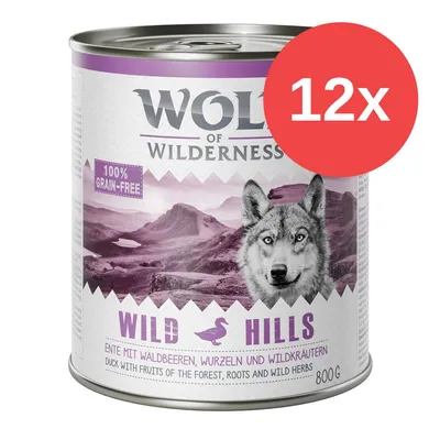 Wolf of Wilderness Wild Hills, 12x800g, 100% grain-free, anatra con frutti di bosco, radici ed erbe selvatiche. Testo in inglese: duck with fruits of the forest, roots and wild herbs.