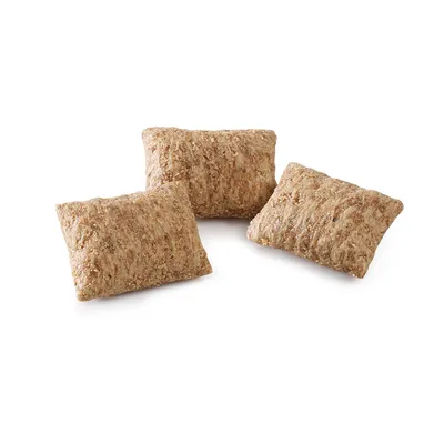 Tre sprøde puder med brun tekstur, synlige som snack eller fodertilskud.