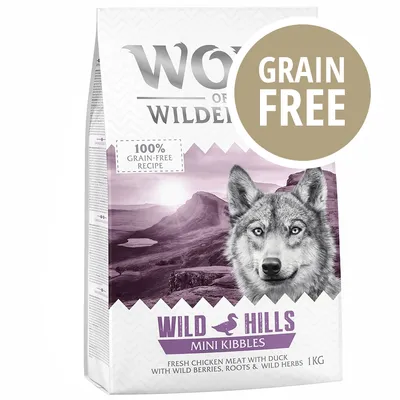 Confezione Wild Hills Mini Kibbles 1 kg, scritte visibili: 100% grain-free recipe, GRAIN FREE, fresh chicken meat with duck with wild berries, roots & wild herbs.