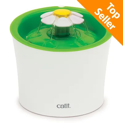 Fontanella per animali Catit con fiore decorativo, scritta 'Top Seller' in alto a destra. Fontanella per animali Catit con fiore decorativo, scritta 'Top Seller' in alto a destra.