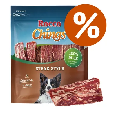 Rocco Chings Steak-Style, 100% duck in the meat content, confezione con snack per cani a forma di bistecca e simbolo percentuale per offerta.