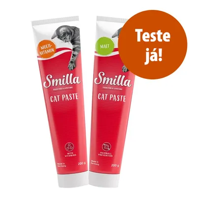 Dois tubos de Smilla Cat Paste, um com etiqueta 'MULTI-VITAMIN', outro 'MALT', ambos 200 g. Texto visível: 'Teste já!'. Indicações: with vitamins, hairball prevention, made in Germany. Dois tubos de Smilla Cat Paste, um com etiqueta 'MULTI-VITAMIN', outro 'MALT', ambos 200 g. Texto visível: 'Teste já!'. Indicações: with vitamins, hairball prevention, made in Germany.