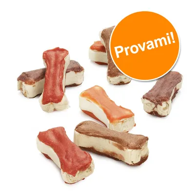 Snack a forma di osso in vari colori, con etichetta arancione che riporta il testo: Provami! Snack a forma di osso in vari colori, con etichetta arancione che riporta il testo: Provami!