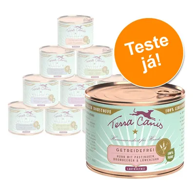 Várias latas de comida para cães Terra Canis, visível texto: 'Getreidefrei', 'Huhn mit Pastinaken, Brombeeren & Löwenzahn', selo '100% Natur' e círculo laranja com 'Teste já!'. Várias latas de comida para cães Terra Canis, visível texto: 'Getreidefrei', 'Huhn mit Pastinaken, Brombeeren & Löwenzahn', selo '100% Natur' e círculo laranja com 'Teste já!'.