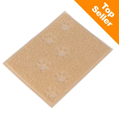 Beige matta med tassavtrycksmönster, material ser ut som plast. Orange hörn med texten Top Seller. Beige matta med tassavtrycksmönster, material ser ut som plast. Orange hörn med texten Top Seller.