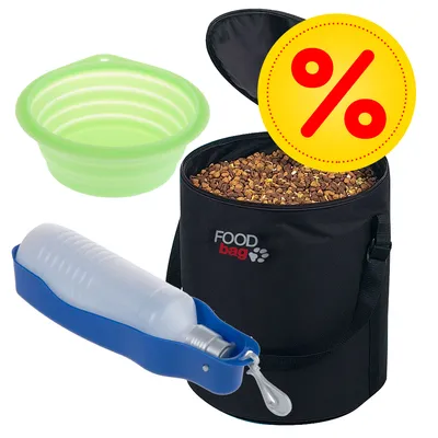 Sac noir FOOD bag ouvert avec croquettes, gamelle pliable verte en plastique et gourde de voyage bleue. Symbole jaune de pourcentage indiquant une offre ou promotion visible.