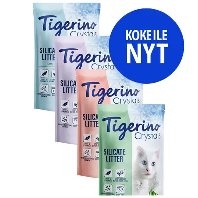 Tigerino Crystals Silicate Litter -kissanhiekkaa eri pakkauksissa, näkyvissä tekstit: light & economical, stops odours, inhibits bacterial growth, dust-free. Sininen ympyrä: KOKEILE NYT.