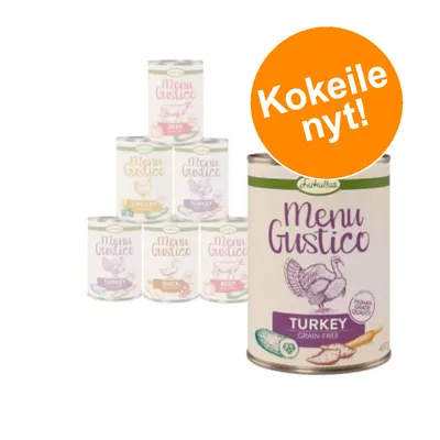Lukullus Menu Gustico -säilykepurkit, etualalla Turkey Grain Free. Oranssi merkki: Kokeile nyt!