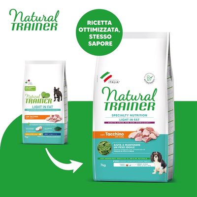 Due confezioni di crocchette per cani Natural Trainer Light in Fat con tacchino, 7 kg. Testo visibile: 'Ricetta ottimizzata, stesso sapore', 'Aiuta a mantenere un peso ideale'.