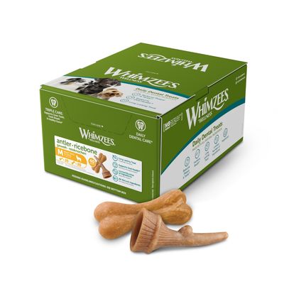 Box of Whimzees Wellness antler and ricebone daily dental treats, medium size, 40 pieces. Key features shown: long lasting, supports oral health, limited ingredients.