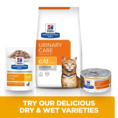 Hill's Prescription Diet Urinary Care c/d multicare suha i mokra hrana za mačke, prikaz vrećice, konzerve i pakiranja s komadićima u umaku. Vidljiv tekst: VETERINARIAN RECOMMENDED.