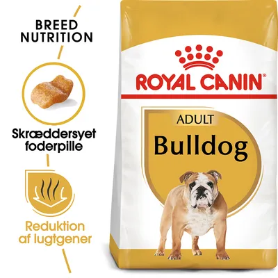 Royal Canin Adult Bulldog tørfoder, tekst: Breed Nutrition, Skræddersyet foderpille, Reduktion af lugtgener. Billede af en bulldog og foderpille på posen. Royal Canin Adult Bulldog tørfoder, tekst: Breed Nutrition, Skræddersyet foderpille, Reduktion af lugtgener. Billede af en bulldog og foderpille på posen.
