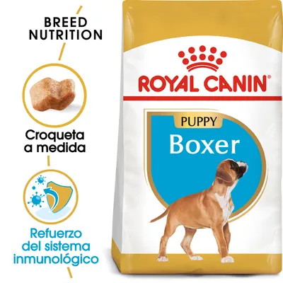Royal Canin Puppy Boxer, croqueta a medida, refuerzo del sistema inmunológico. Texto en inglés: Breed Nutrition. Imagen de cachorro boxer en el envase. Royal Canin Puppy Boxer, croqueta a medida, refuerzo del sistema inmunológico. Texto en inglés: Breed Nutrition. Imagen de cachorro boxer en el envase.