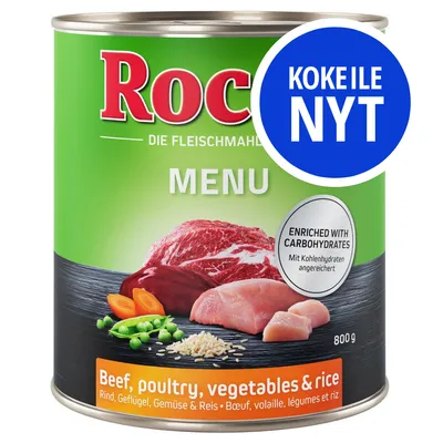 Rocco MENU 800 g, Beef, poultry, vegetables & rice. KOKEILE NYT -merkintä. Enriched with carbohydrates. Kuvassa lihaa, kanaa, herneitä, porkkanaa ja riisiä.