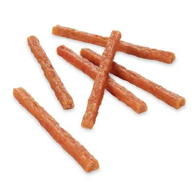 Bâtonnets à mâcher pour animaux, texture moelleuse, couleur brun orangé, présentés sans emballage ni marque visible.