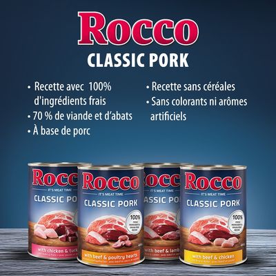 Rocco Classic Pork. Recette avec 100 % d’ingrédients frais, 70 % de viande et d’abats, à base de porc, sans céréales, sans colorants ni arômes artificiels. Boîtes visibles en bas.