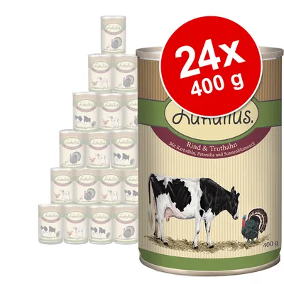 Lukullus Rind & Truthahn -säilykeruoka, 24 x 400 g. Etiketissä lehmä ja kalkkuna, teksti: Mit Kartoffeln, Petersilie und Sonnenblumenöl.
