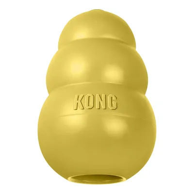 Jouet KONG jaune avec l'inscription KONG en relief, fabriqué dans un matériau robuste, creux avec une ouverture en bas.