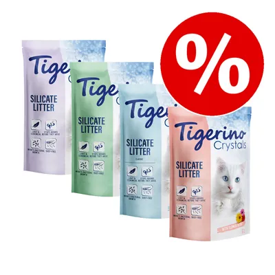Tigerino Silicate Litter kattsand, fyra olika förpackningar med synliga ikoner och text, stor röd procent-symbol för rabatt i hörnet.