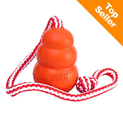 KONG leksak i orange gummi med rödvit rep, texten 'Top Seller' i orange hörn. Synlig KONG-logotyp på produkten.