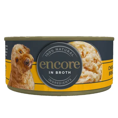 Tin labelled '100% natural ingredients, encore in broth' with visible chicken breast pieces.