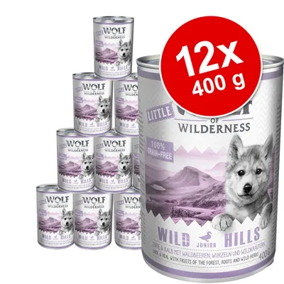 Wolf of Wilderness Little Wild Hills Junior -koiran märkäruoka, 12 x 400 g. Pakkauksessa teksti: 100% grain-free. Maku: ankka & vasikka metsämarjoilla ja yrteillä.