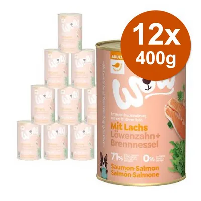 12 lattine da 400 g di cibo per cani Wow Mit Lachs Löwenzahn + Brennnessel, visibile salmone e testo: 71% carne, 0% cereali. Etichetta in tedesco, francese, inglese e italiano.