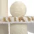 Kratzbaum-Elemente aus Sisal-Seil und Plüsch mit beige-weißer Musterung, inklusive Spielball aus Sisal.