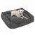 Graues Hundebett mit geripptem Stoff, rechteckige Form. Ein heller Hund liegt entspannt darauf.