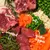 Image showing labelled ingredients: lamb, seaweed, oats, garden veggies including carrots and peas.