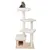 Cat tree with four levels, sisal posts and padded lying areas. Enclosed cave at the bottom, top platform with play ball. Cat sitting on top level.