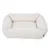 White, rectangular pet bed with soft padding and raised edge. Small brand label visible on the side.