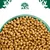Bowl filled with small, brown dry food pellets. Green tree and animal symbol above the bowl.