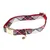 Collier pour animal à motif écossais rouge, blanc et bleu, boucle métallique dorée et anneau d’attache avec petite médaille ronde visible.