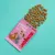 Edgard Cooper bonbons pour chiots, saveur canard et poulet. Emballage avec petits morceaux visibles.
