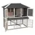 Jaula de varios niveles para pequeños animales de madera con techo negro, puertas de rejilla y zona interior. Apta para exterior, con varios accesos y base extraíble.