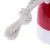 Jouet pour chien avec corde en coton tressé et partie en plastique rouge et blanc, nœud visible sur la corde.