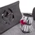 Grey felt toy with a leaf-shaped cut-out and a cylindrical play module with tassels and a red plush ball. Suitable for interactive play.