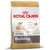 Royal Canin Junior Bulldog hondenvoer, tot 12 maanden. Tekst: Digestive Health, Bone and Joint Health, Natural Defences. Afbeelding van een jonge bulldog en brokjes.
