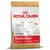 Royal Canin Junior Dalmatian hondenvoer, tot 15 maanden, met afbeelding van een dalmatiër en tekst over urinewegen, spijsvertering en natuurlijke afweer. Verpakking met zipsysteem.