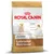 Royal Canin Junior Labrador Retriever hondenvoer, tot 15 maanden. Tekst: gezonde groei en gewicht, spijsvertering, natuurlijke afweer. Afbeelding brokjes en hond zichtbaar op verpakking.