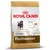 Royal Canin Junior Rottweiler hondenvoer, tot 18 maanden. Tekst: spier- en botontwikkeling, spijsvertering, natuurlijke afweer, exclusieve brok. Afbeelding van een jonge Rottweiler.