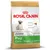 Bag showing Royal Canin Junior Pug food for up to 10 months old, with features: healthy skin, digestive health, natural defences, exclusive kibble shape, and Omega 3.