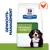 Hill's Prescription Diet Metabolic + Mobility Hundefutter für Gewichtsmanagement mit Huhn. Verpackung zeigt Hund und Huhn-Symbol.
