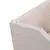 Corner of a wooden structure with visible grain and plastic protective cap on the upper corner.
