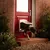 Pet using a door flap, demonstrating how the pet door allows animals to enter or exit through a closed door.