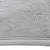 Close-up of grey fabric material with soft, fluffy texture and visible seam.